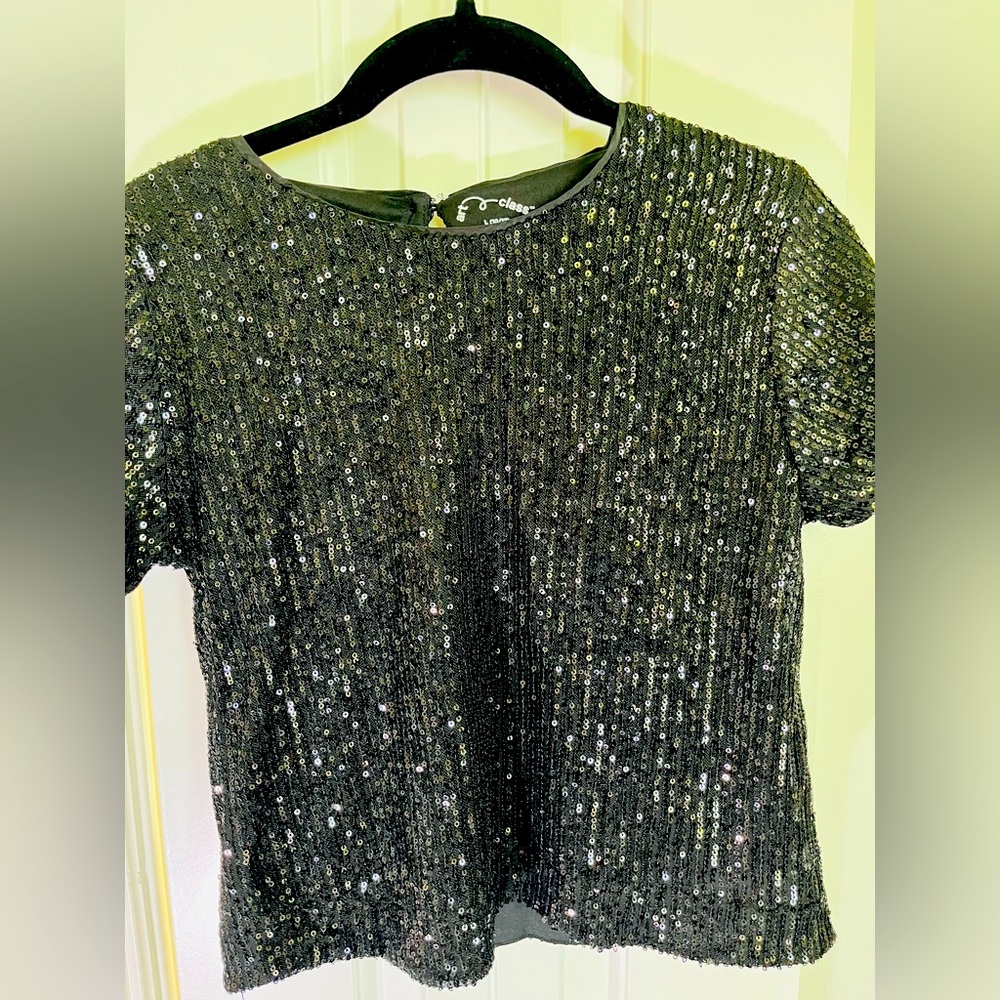 Black sequins set with wide leg pants and top.